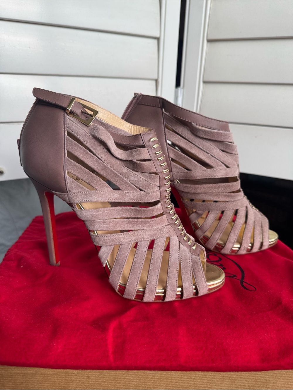 Authentic Christian Louboutin Karina 120 caged ankle booties.